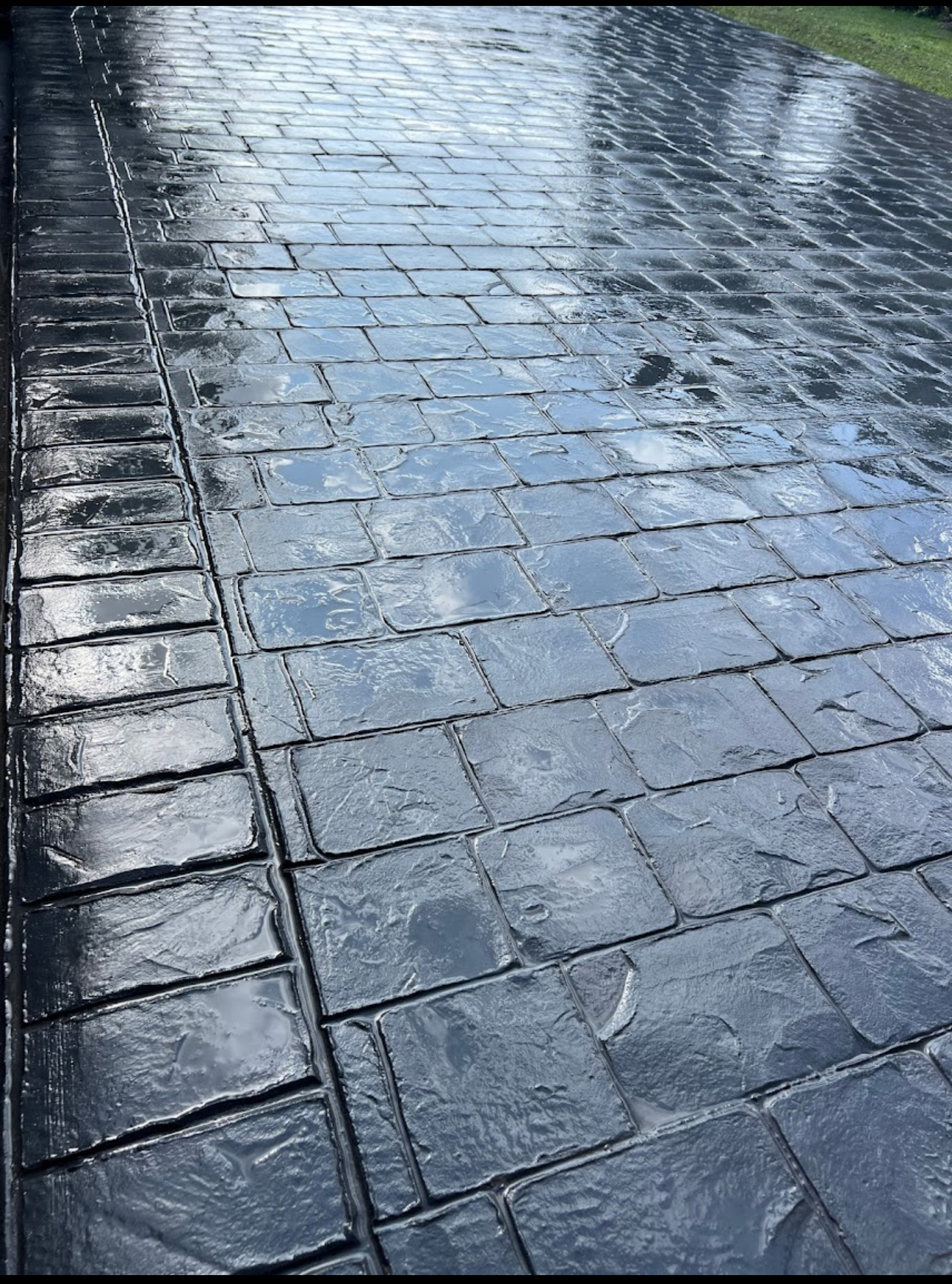 Stamped concrete patio installed by Inspire Contracting